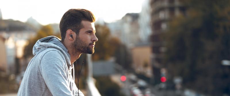 Man sitting and overlooking city